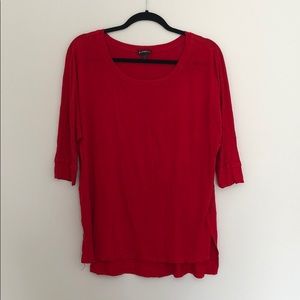 Express oversized piko-style top. 1/2 sleeve.